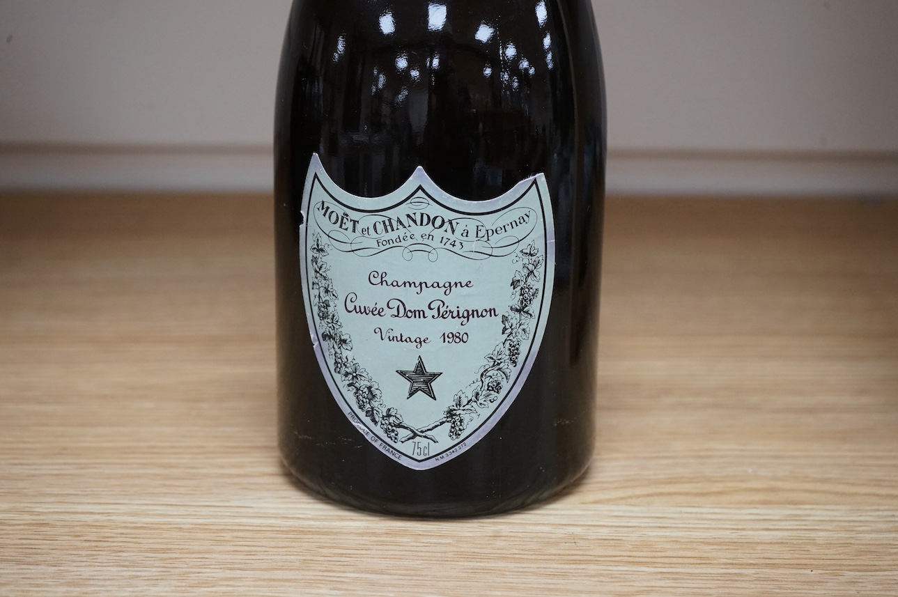 A bottle of Moët Chandon Dom Perignon 1980. Condition - wear to label